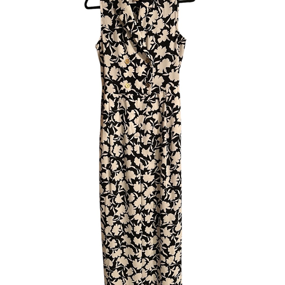 Michael Kors jumpsuit in black and white white with gold buttons so sharp